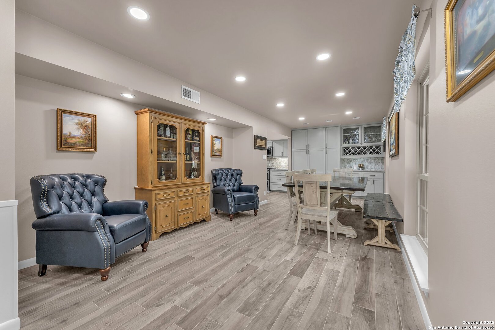 11650 Sunset Ranch Helotes, TX 78023 - Photo 15 of 141 a living room with furniture and a wooden floor