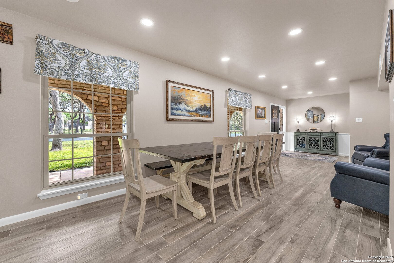 11650 Sunset Ranch Helotes, TX 78023 - Photo 17 of 141 a living room with furniture and a wooden floor