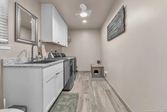 a view of a car park in front of a house