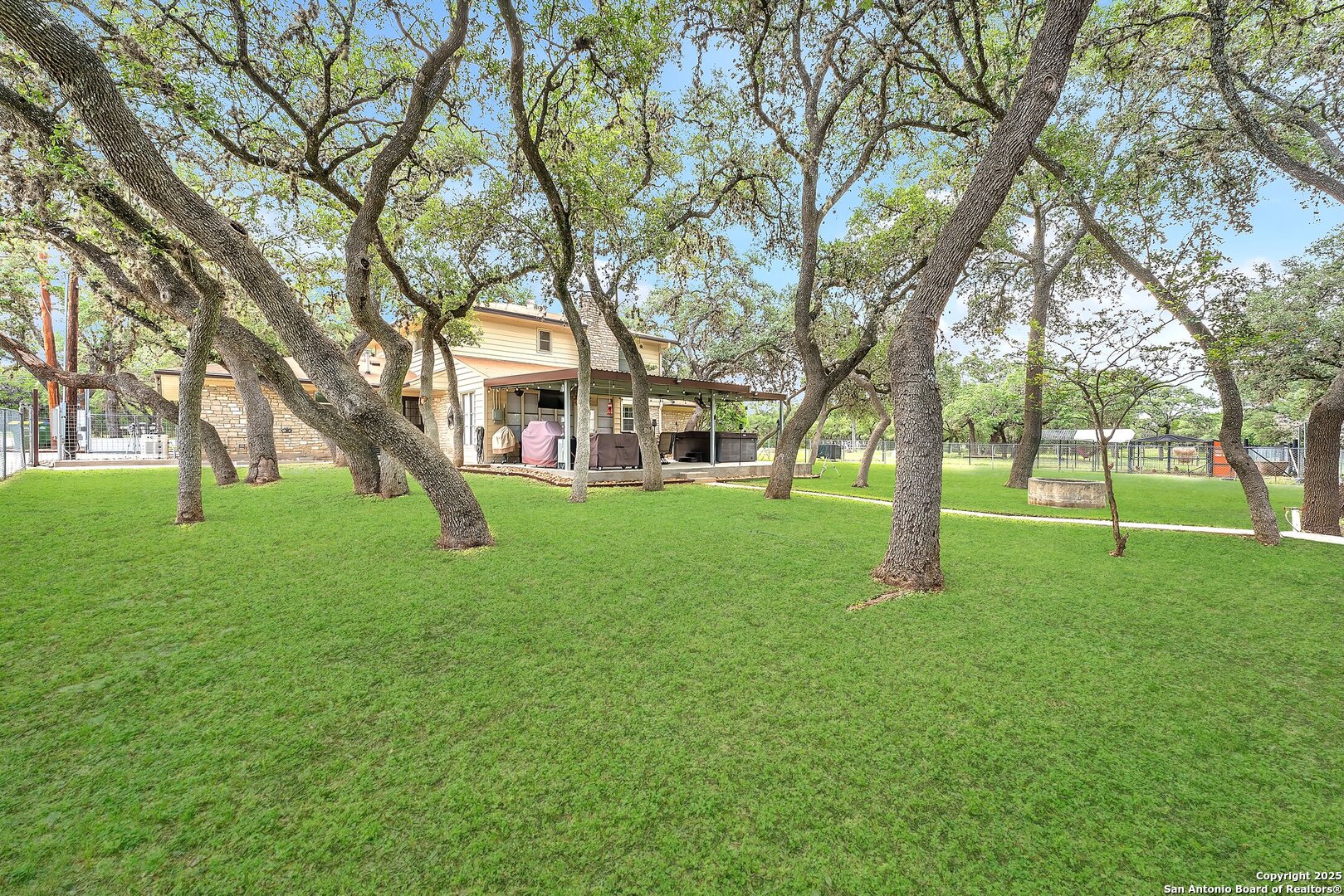 11650 Sunset Ranch Helotes, TX 78023 - Photo 74 of 141 a view of a house with a backyard