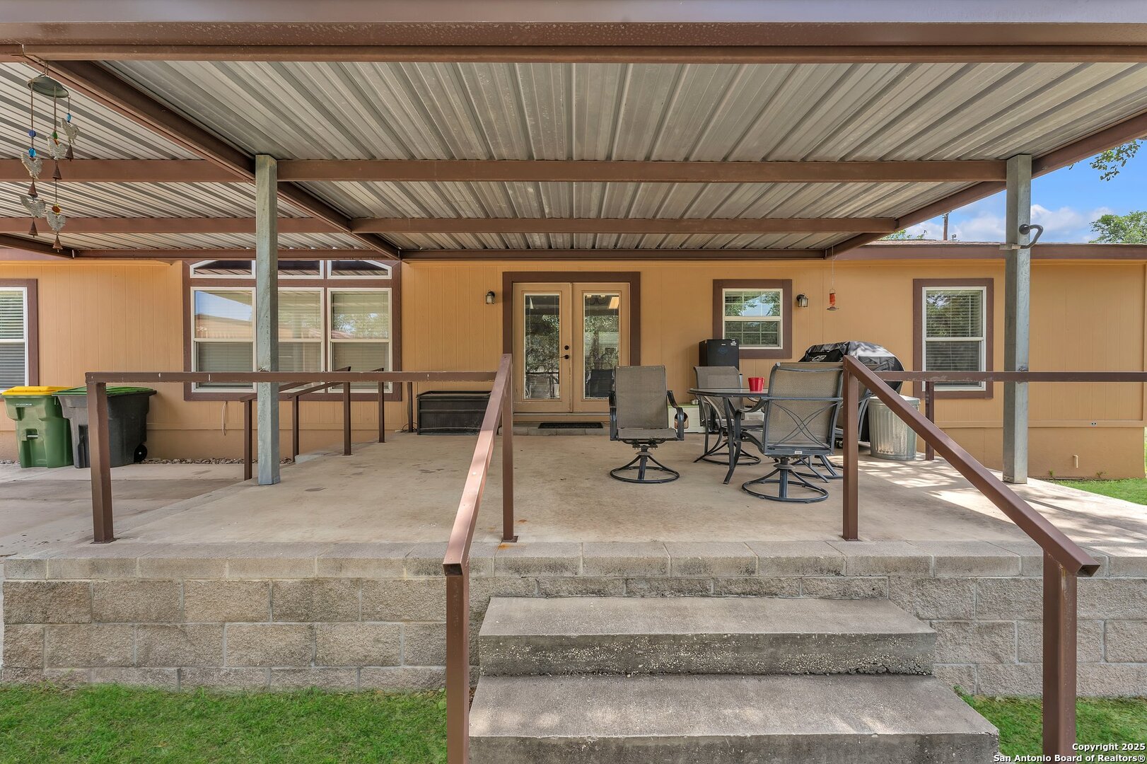11650 Sunset Ranch Helotes, TX 78023 - Photo 100 of 141 a view of a patio with table and chairs