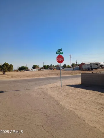a backyard of a house with lots of trees