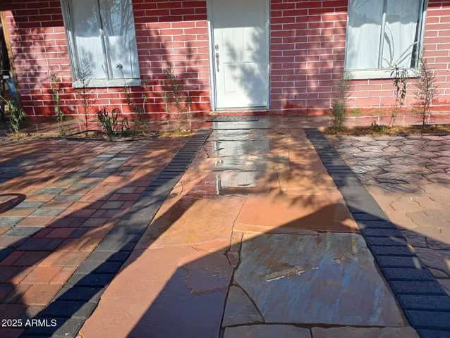 a view of a brick building with an empty space