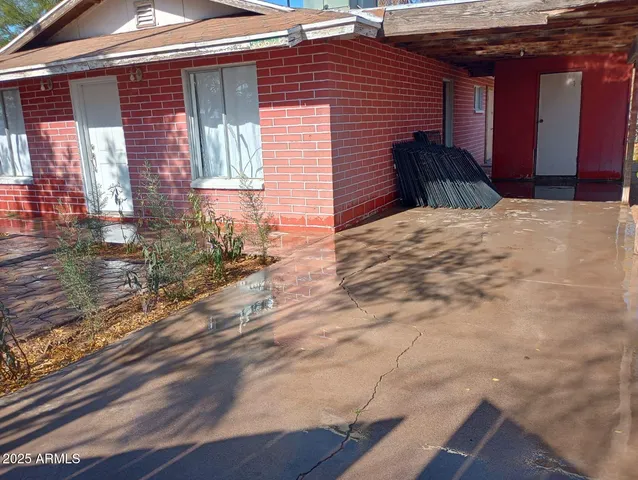 a view of a backyard of a house