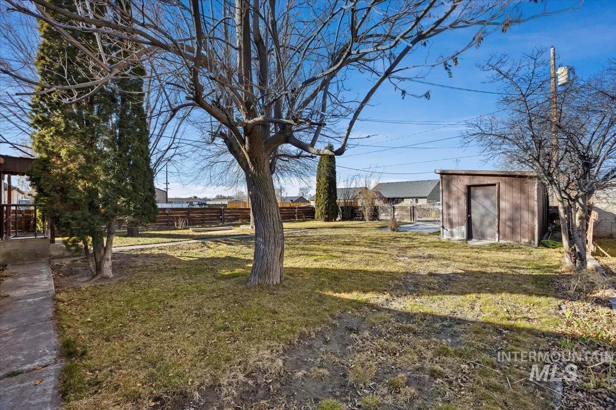 534 Miller Avenue Burley, ID 83318 - Photo 27 of 27 Fenced backyard featuring a storage shed