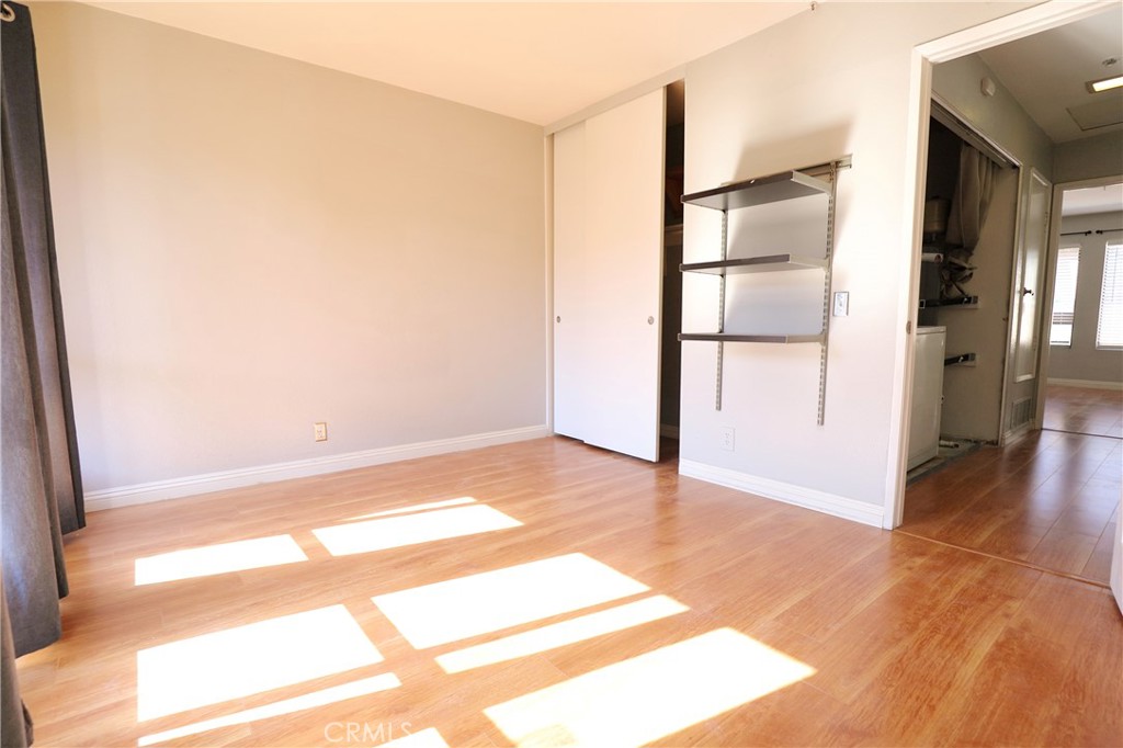 25885 Trabuco Road, Unit 235 Lake Forest, CA 92630 - Photo 11 of 16 a view of empty room with wooden floor and fan