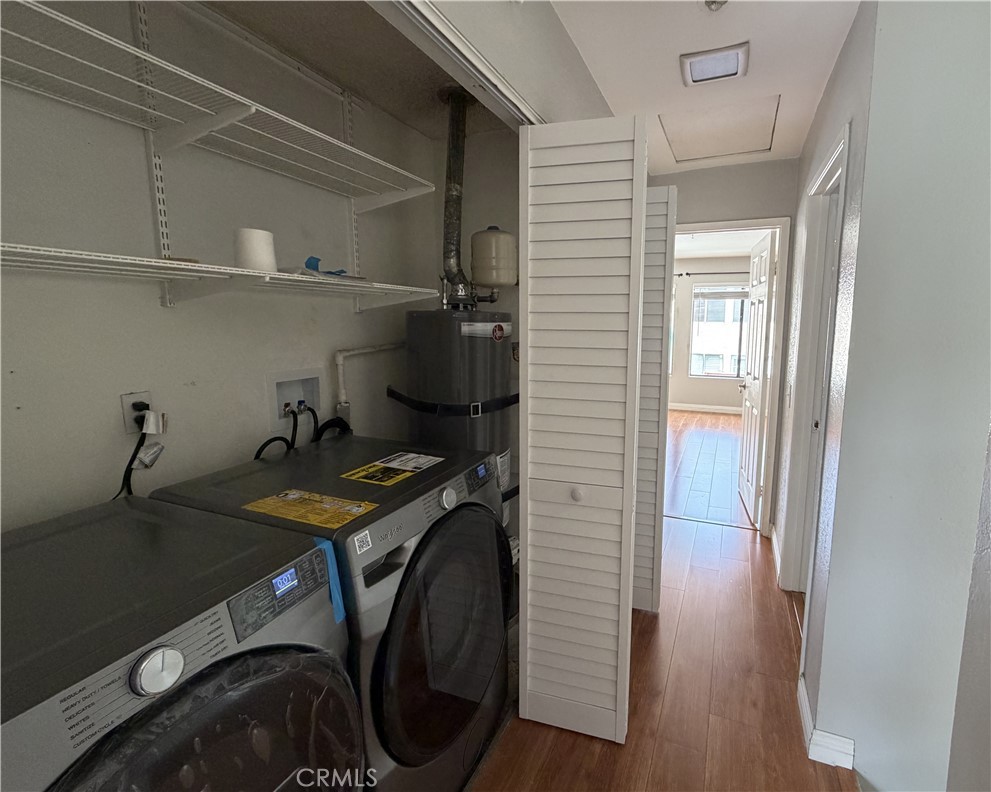 25885 Trabuco Road, Unit 235 Lake Forest, CA 92630 - Photo 16 of 16 a storage room with washer and dryer