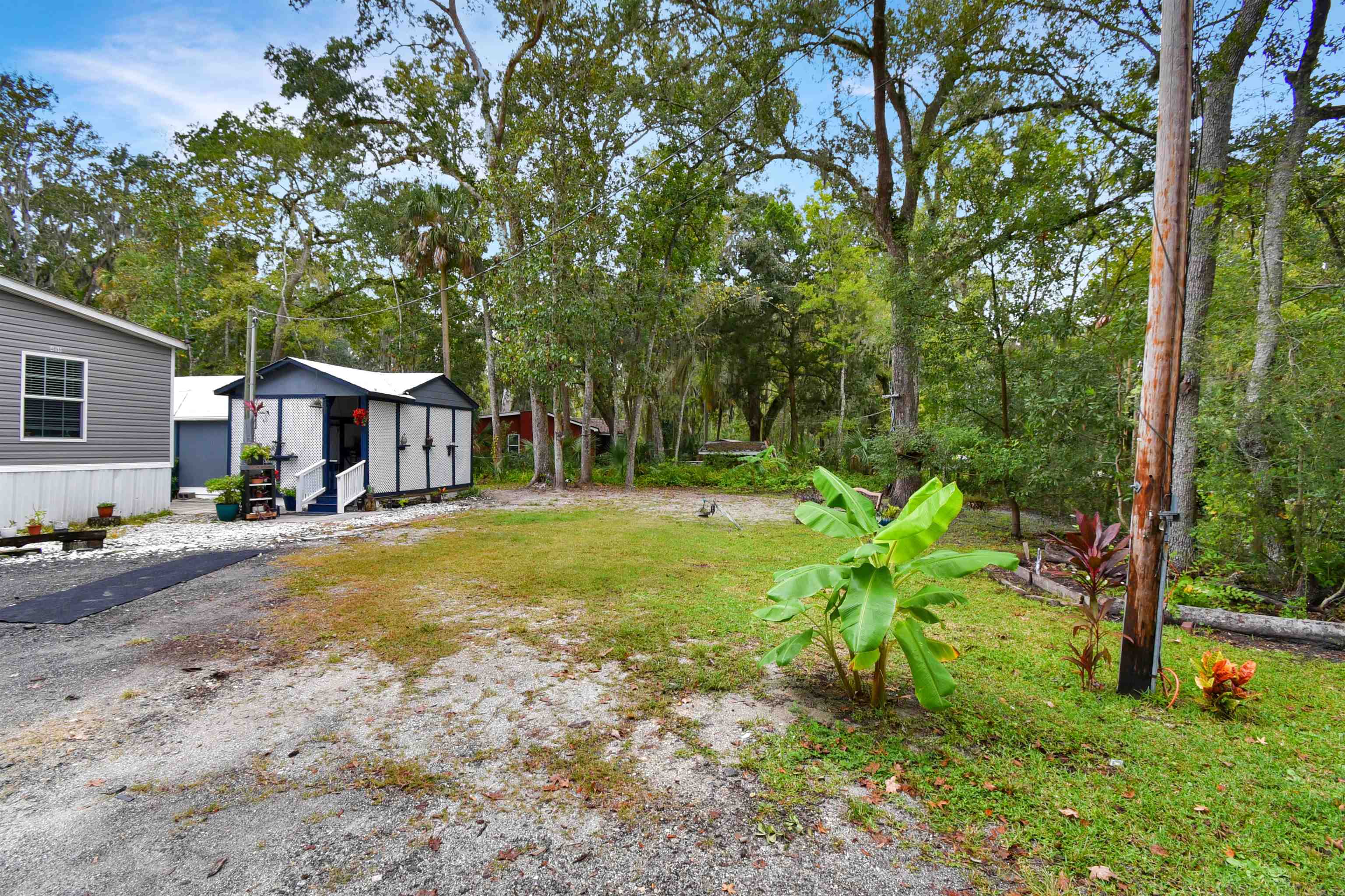 4895 Ave D, Unit B St. Augustine, FL 32095 - Photo 19 of 22 a view of a house with backyard and sitting area