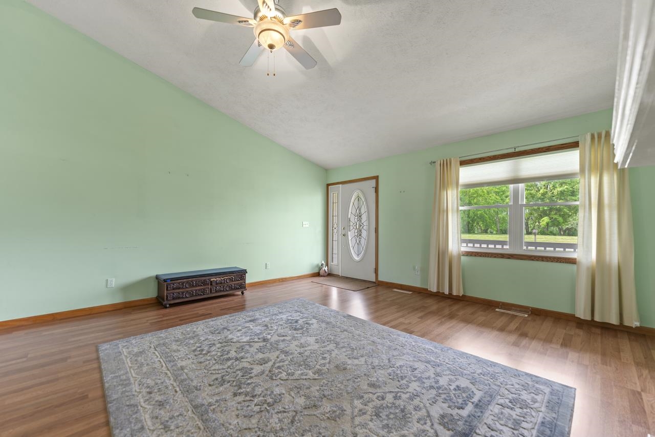 816 Lake Summerset Road Lake Summerset, IL 61019 - Photo 9 of 29 a view of livingroom with window and hardwood floor