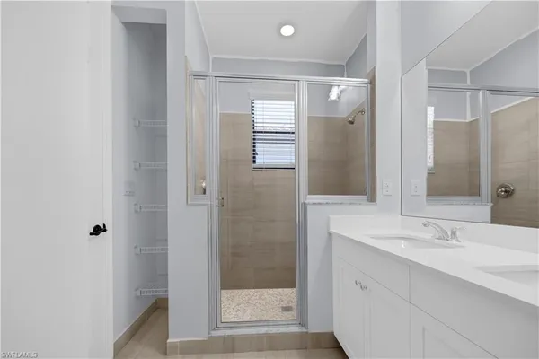 a view of a bathroom with wooden floor