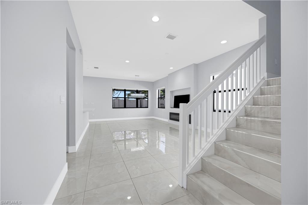 9045 Madrid Circle Naples, FL 34104 - Photo 10 of 46 a view of entryway and hall