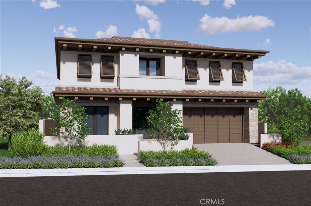 a front view of a house with garage