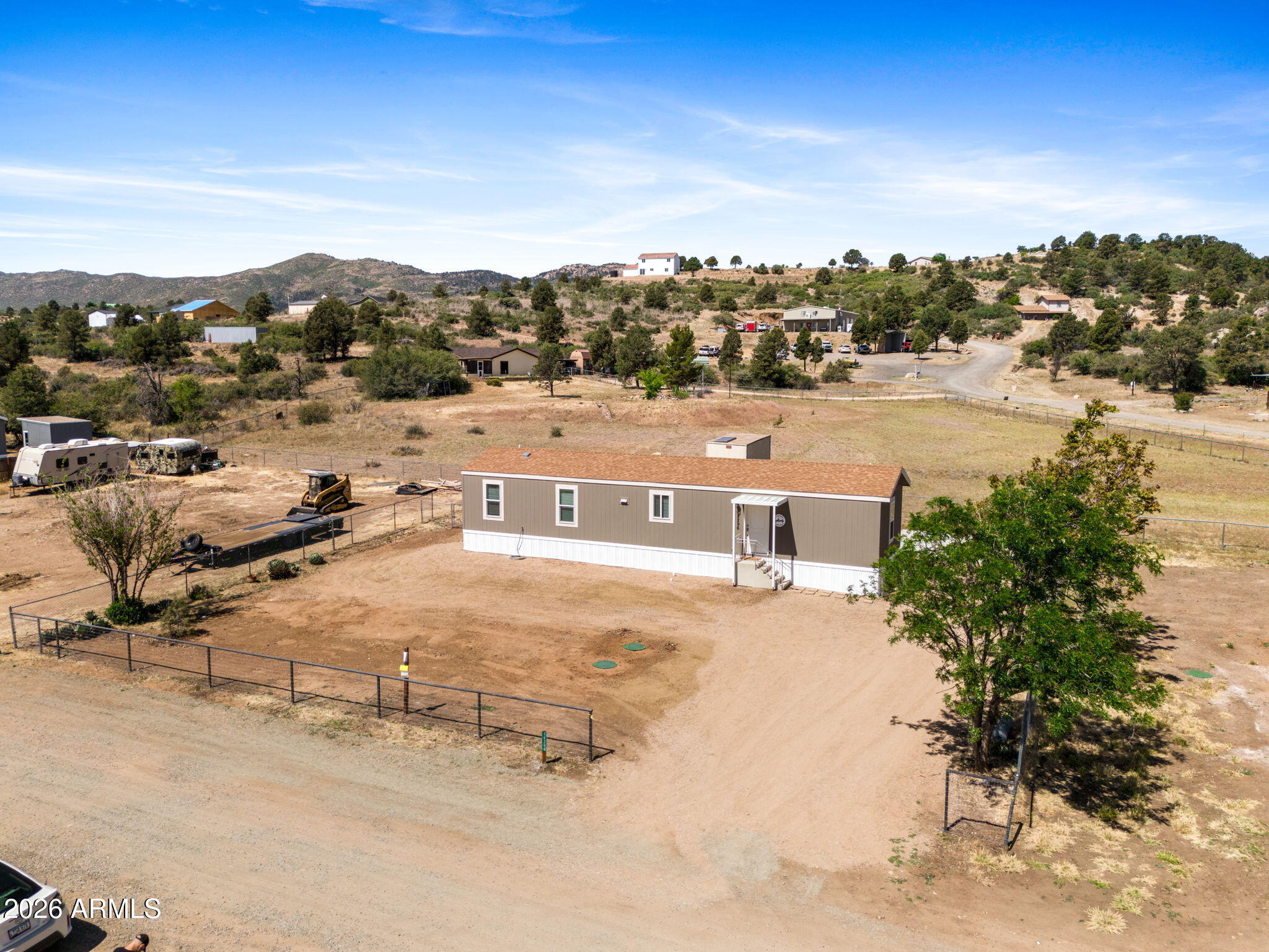 18296 Frontier Road Peeples Valley, AZ 86332 - Photo 32 of 44 a view of a terrace with a lake view