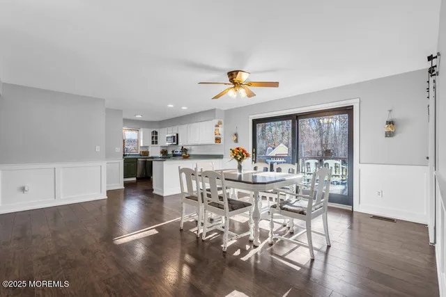 a view of a living room and dining room