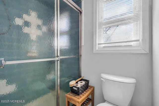 a bedroom with a large bed and a furniture