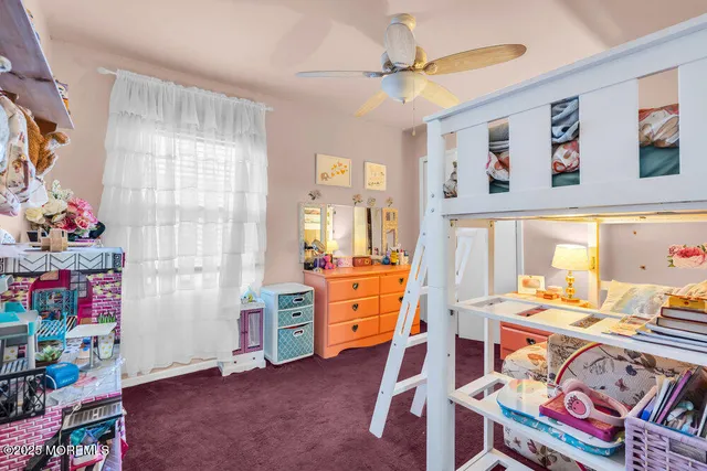 a view of a chairs and table on the wooden floor