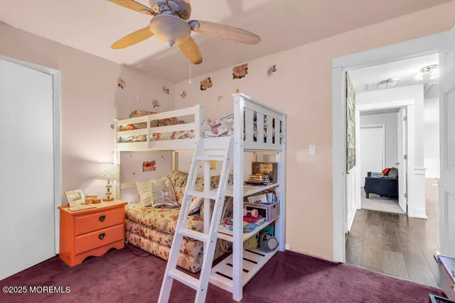 a view of a chairs and tables in the back yard of the house