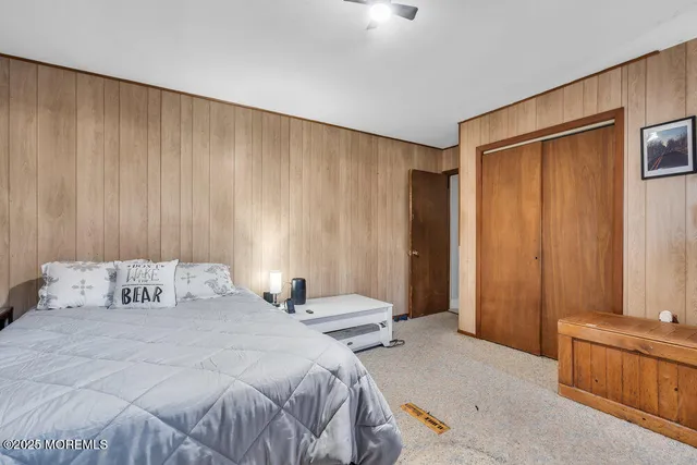 a view of a house with backyard and porch