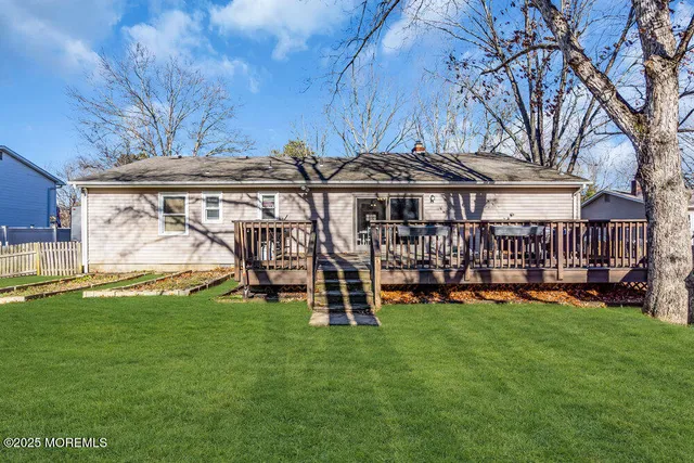 a view of a park with large trees
