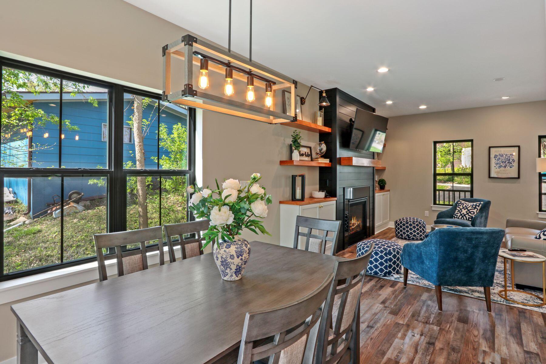 787 Odsila Way Fontana, WI 53125 - Photo 6 of 26 Dining Flows Into Great Room