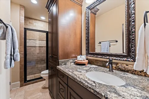 a bed room with a bed and a window