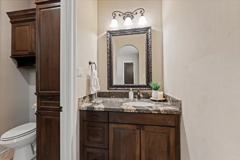 a bedroom with bed and window