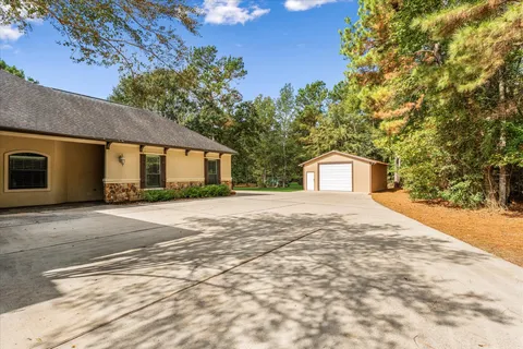 a house with trees in front of it