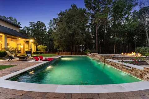 a view of a yard with an outdoor space