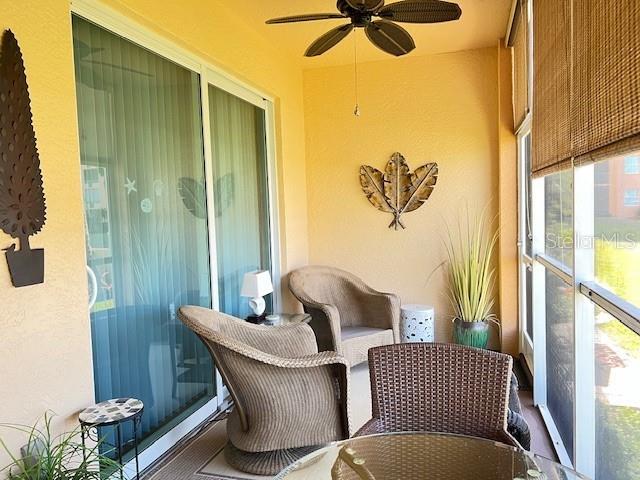 2060 Matecumbe Key Road, Unit 2104 Punta Gorda, FL 33955 - Photo 14 of 44 a living room with furniture and a window