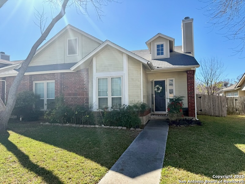 3420 Ridge Smoke San Antonio, TX 78247 - Photo 1 of 20 a front view of a house with garden