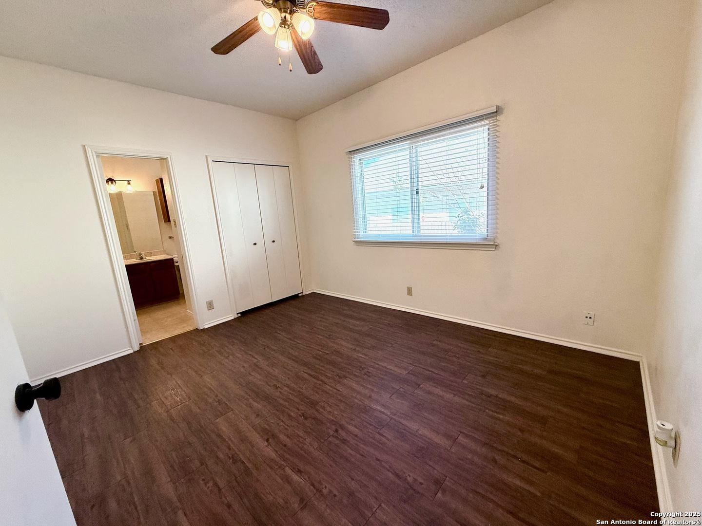 3420 Ridge Smoke San Antonio, TX 78247 - Photo 15 of 20 wooden floor in an empty room with a window