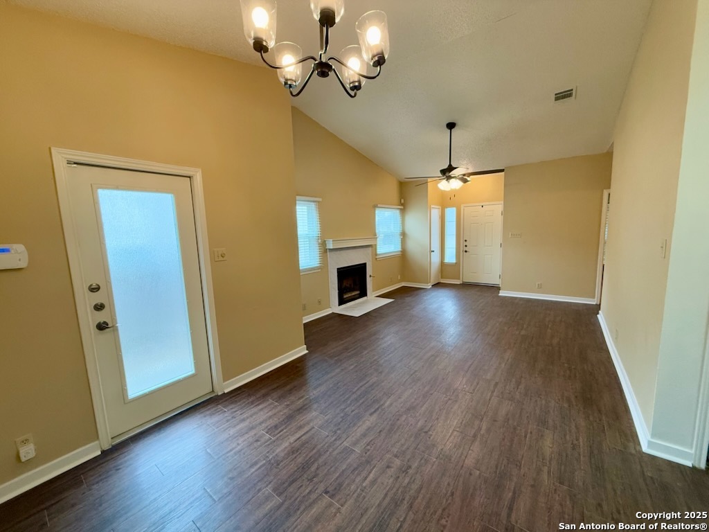 3420 Ridge Smoke San Antonio, TX 78247 - Photo 5 of 20 a view of a livingroom with wooden floor and a ceiling fan