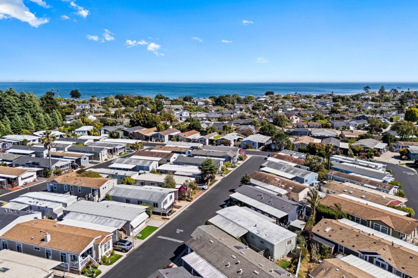 4160 Jade Street, Unit 90 Capitola, CA 95010 - Photo 16 of 18 an aerial view of a city with lots of residential buildings and ocean view