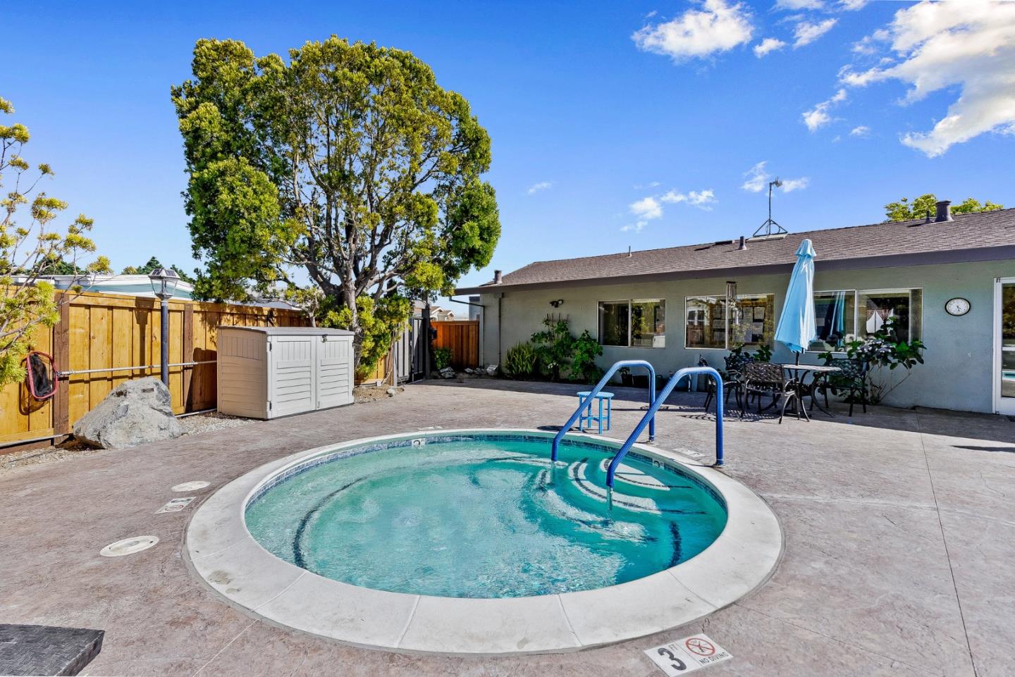 4160 Jade Street, Unit 90 Capitola, CA 95010 - Photo 18 of 18 a view of a swimming pool with a patio