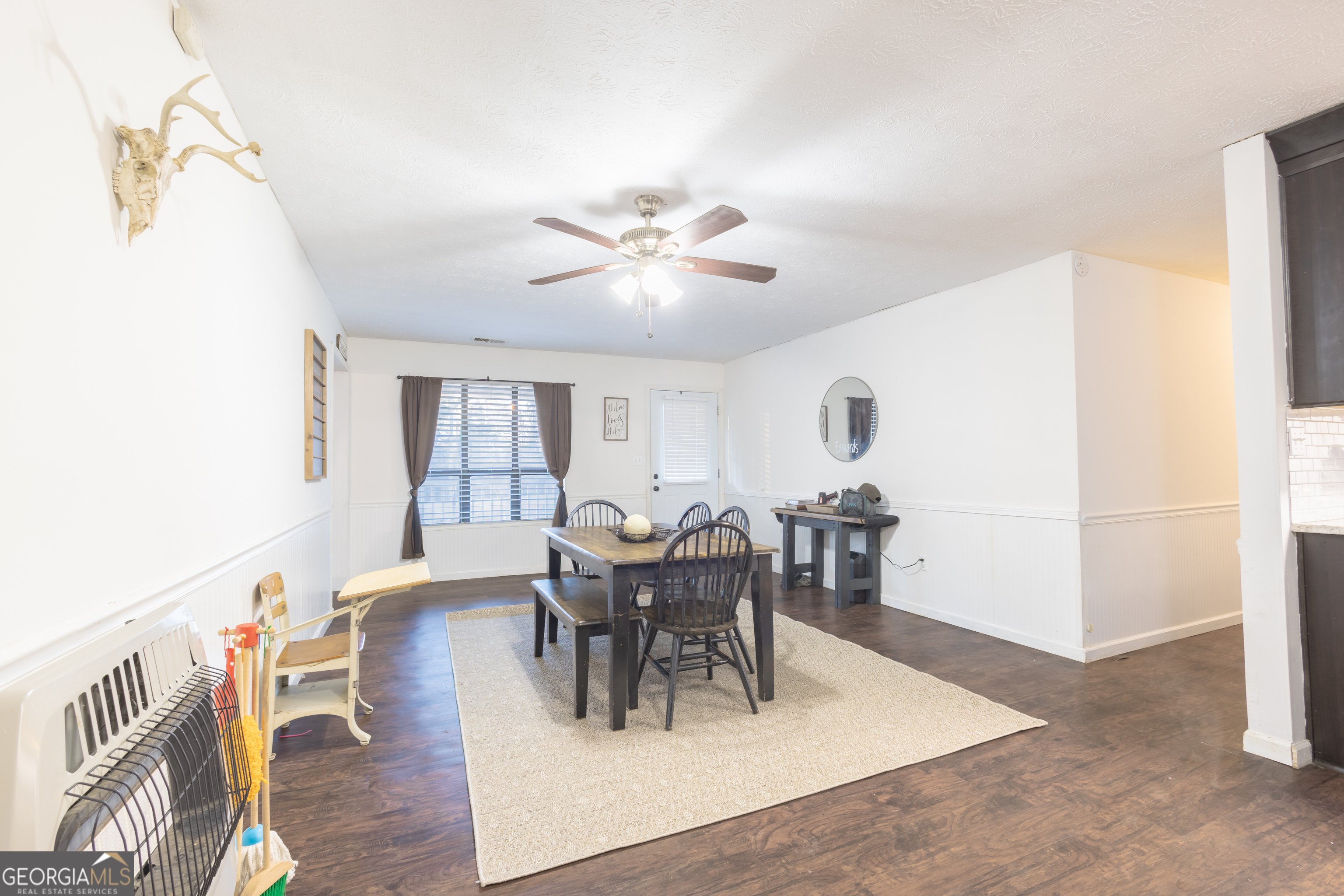 820 County Road 14 Muscadine, AL 36269 - Photo 15 of 20 a view of a dining room with furniture and chandelier
