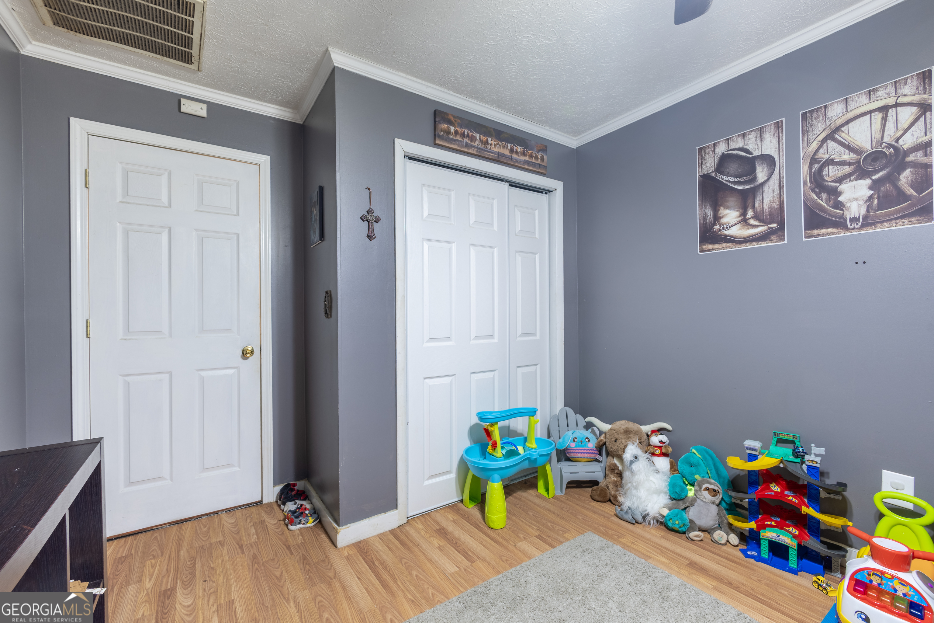 820 County Road 14 Muscadine, AL 36269 - Photo 17 of 20 a kids room with toys and wooden floor