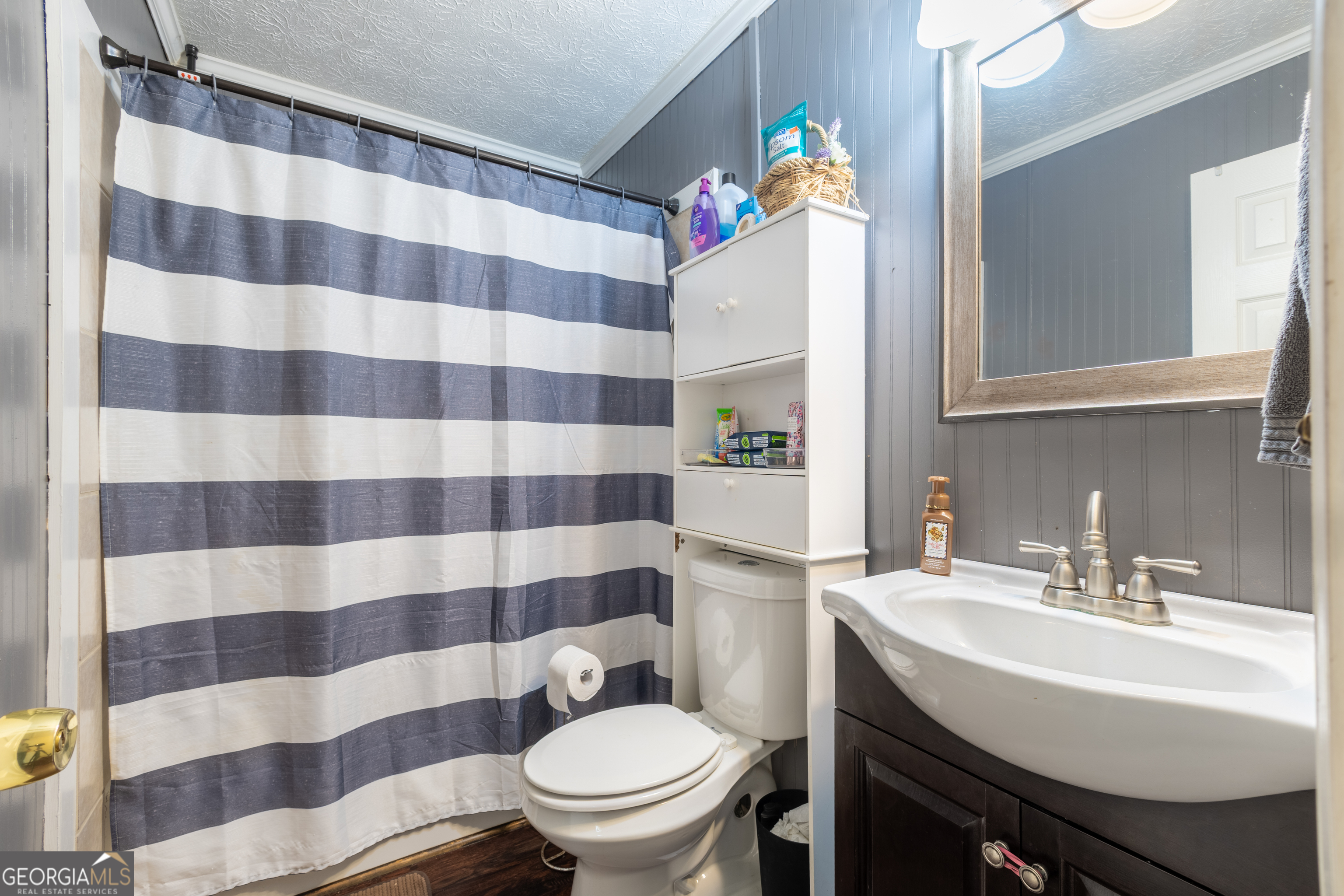 820 County Road 14 Muscadine, AL 36269 - Photo 18 of 20 a bathroom with a sink toilet and shower