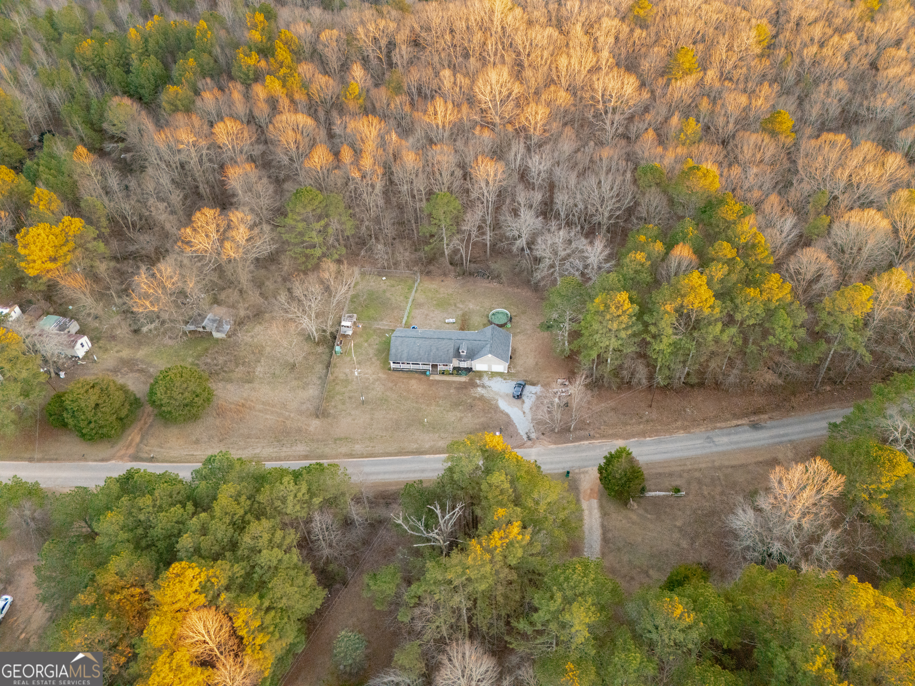 820 County Road 14 Muscadine, AL 36269 - Photo 2 of 20 a view of a yard with large trees
