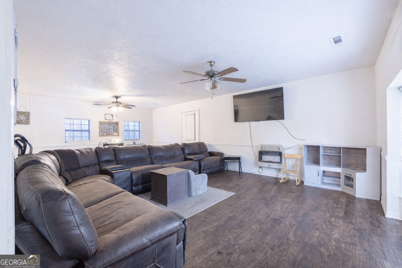 820 County Road 14 Muscadine, AL 36269 - Photo 4 of 20 a living room with furniture and a flat screen tv