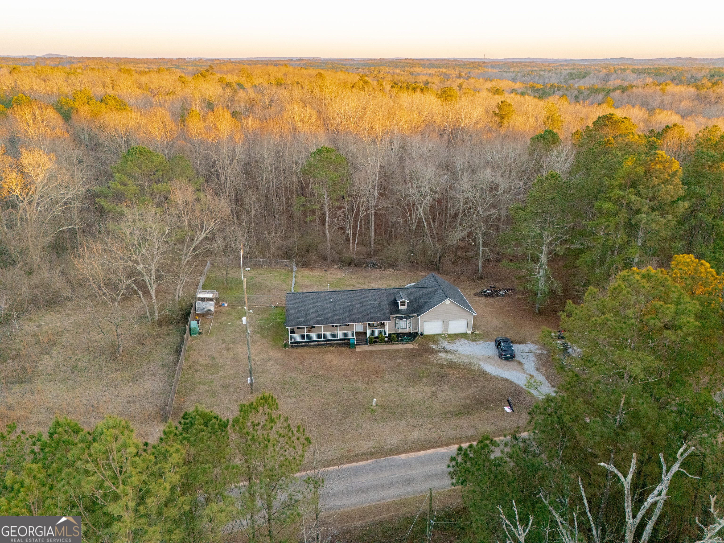 820 County Road 14 Muscadine, AL 36269 - Photo 7 of 20 a view of a lake with a yard and mountain view