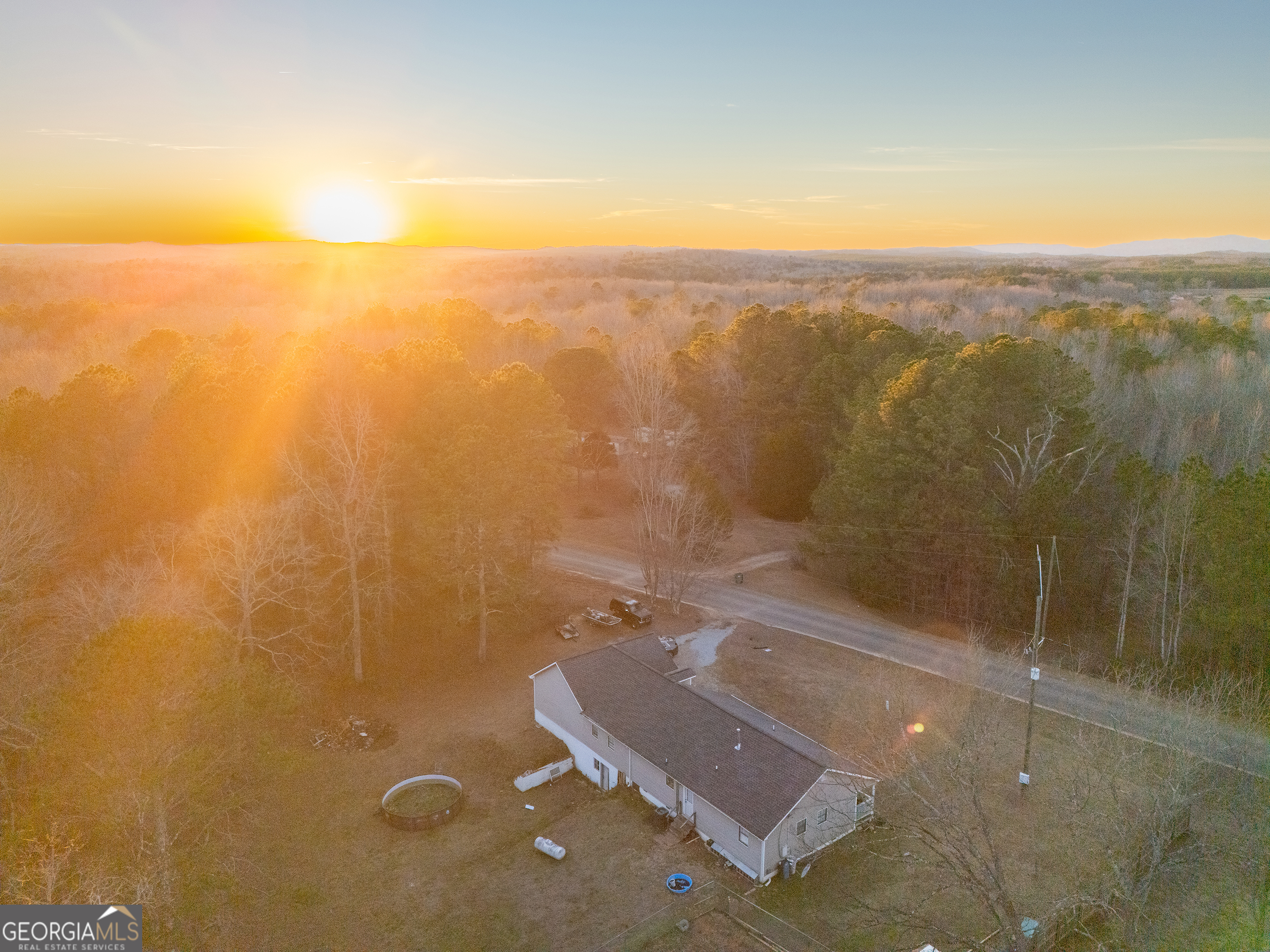820 County Road 14 Muscadine, AL 36269 - Photo 9 of 20 an aerial view of residential houses with outdoor space