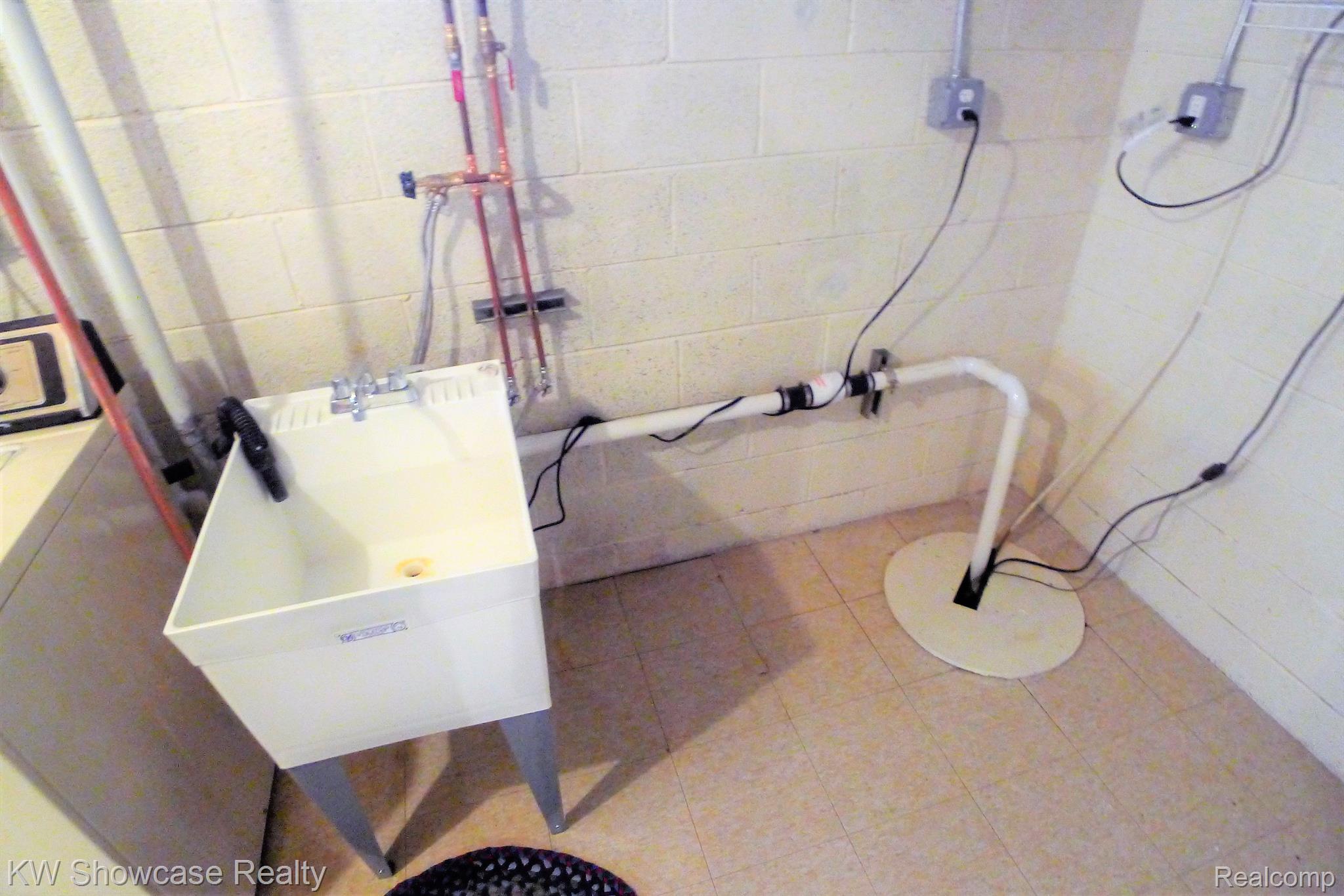 7131 Springridge Road West Bloomfield, MI 48322 - Photo 31 of 47 Laundry Tub and Plumbing updated.