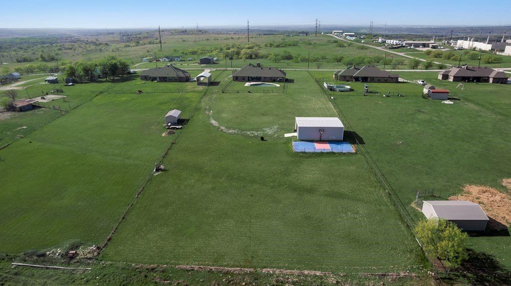 461 Pearson Ranch Road Azle, TX 76020 - Photo 10 of 40 Workshop is spacious enough for sports vehicles or a home business. No HOA restrictions.