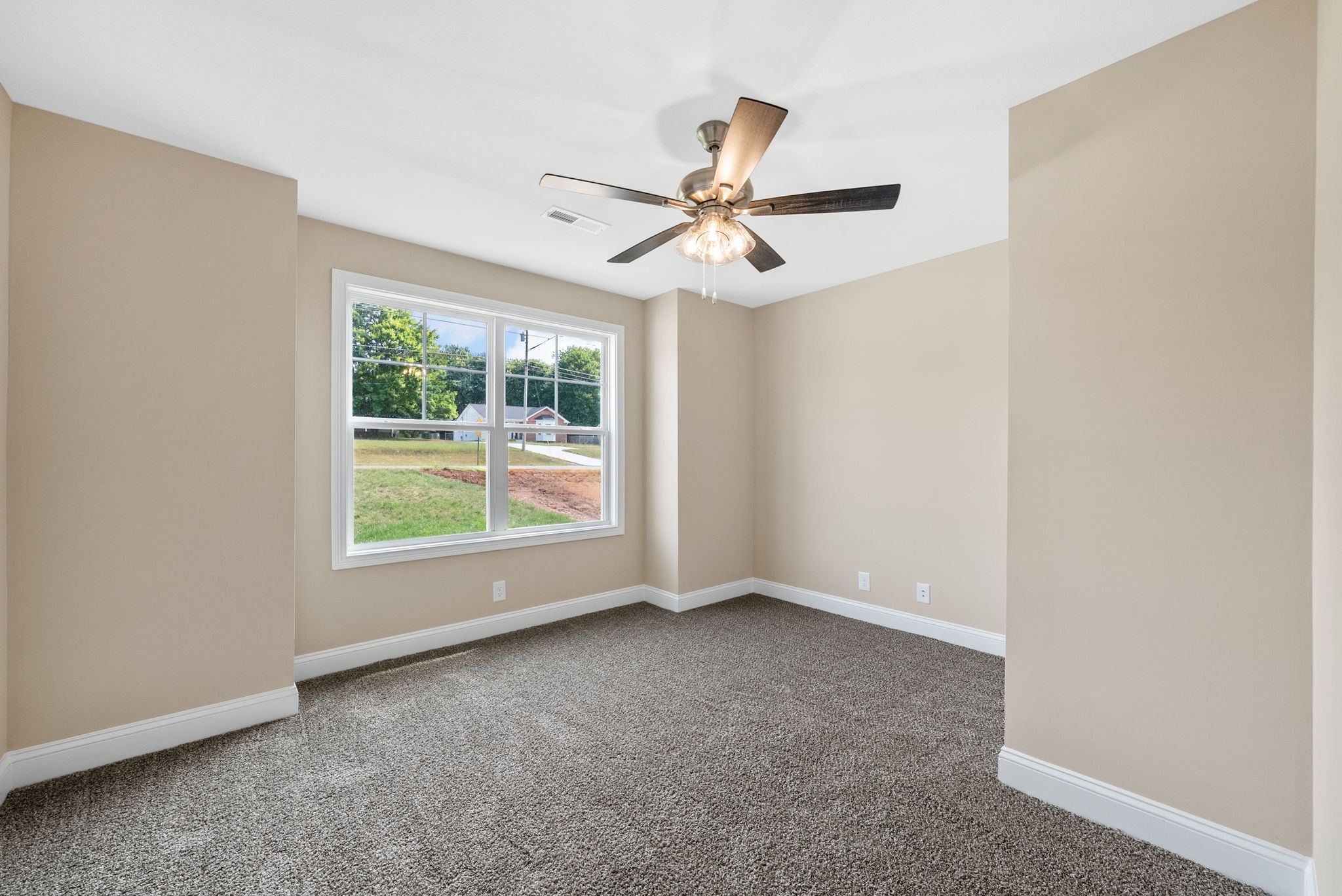 34 Echo Ridge Oak Grove, KY 42262 - Photo 19 of 33 an empty room with windows and fan