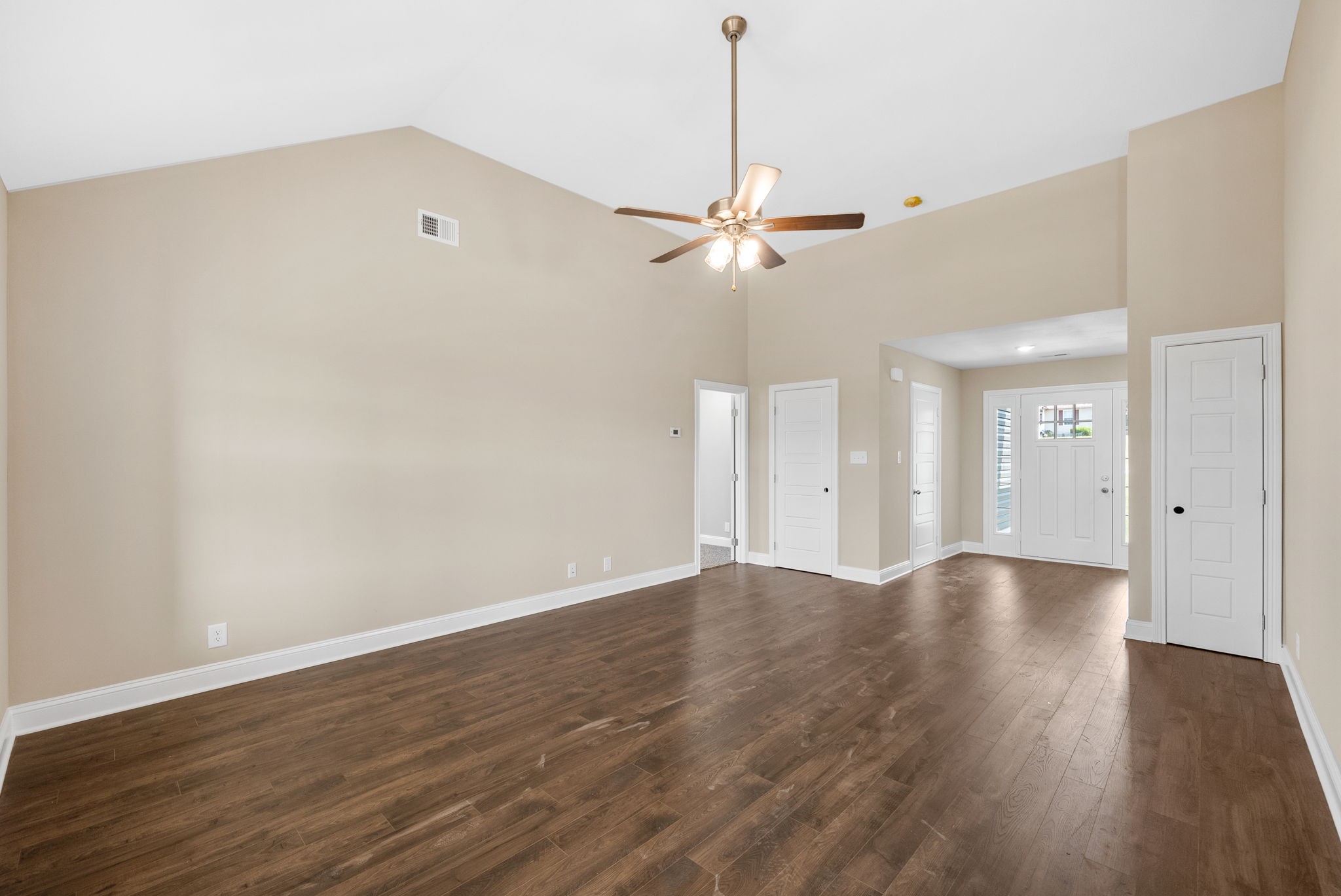 34 Echo Ridge Oak Grove, KY 42262 - Photo 4 of 33 a view of an empty room with wooden floor and a ceiling fan