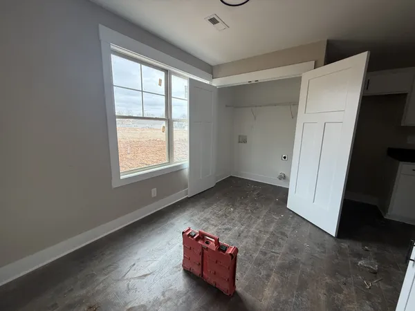 an empty room with windows