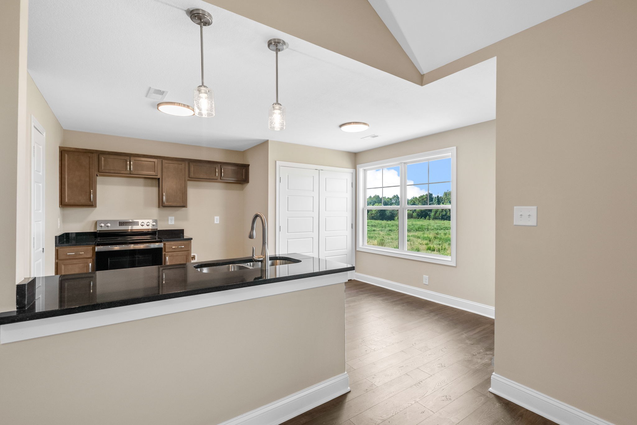 34 Echo Ridge Oak Grove, KY 42262 - Photo 6 of 33 a kitchen with stainless steel appliances a sink a stove a microwave and a refrigerator
