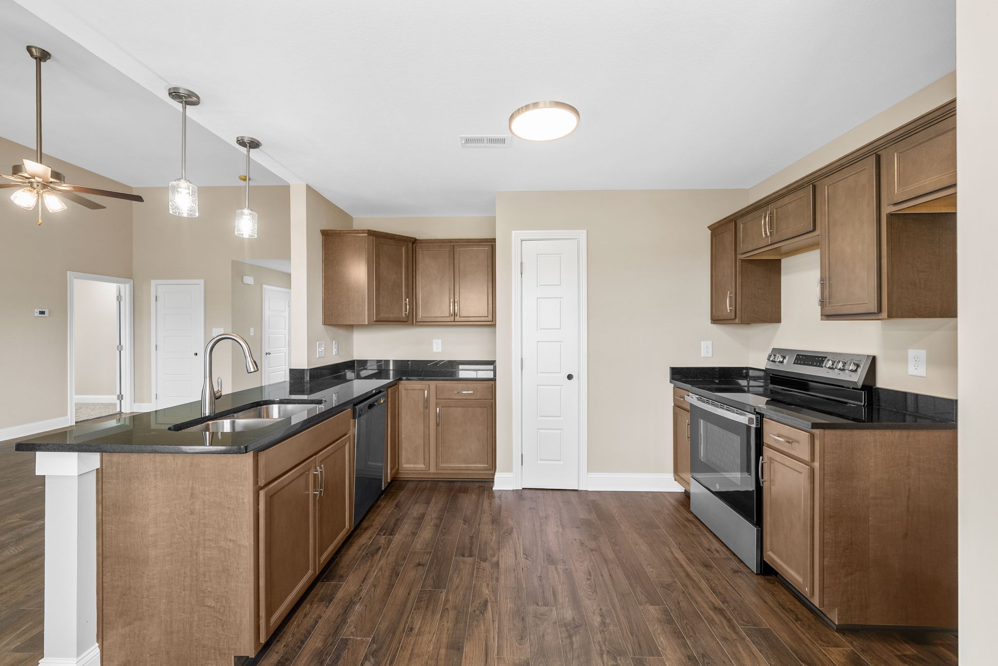 34 Echo Ridge Oak Grove, KY 42262 - Photo 10 of 33 a kitchen with stainless steel appliances granite countertop a stove and a sink
