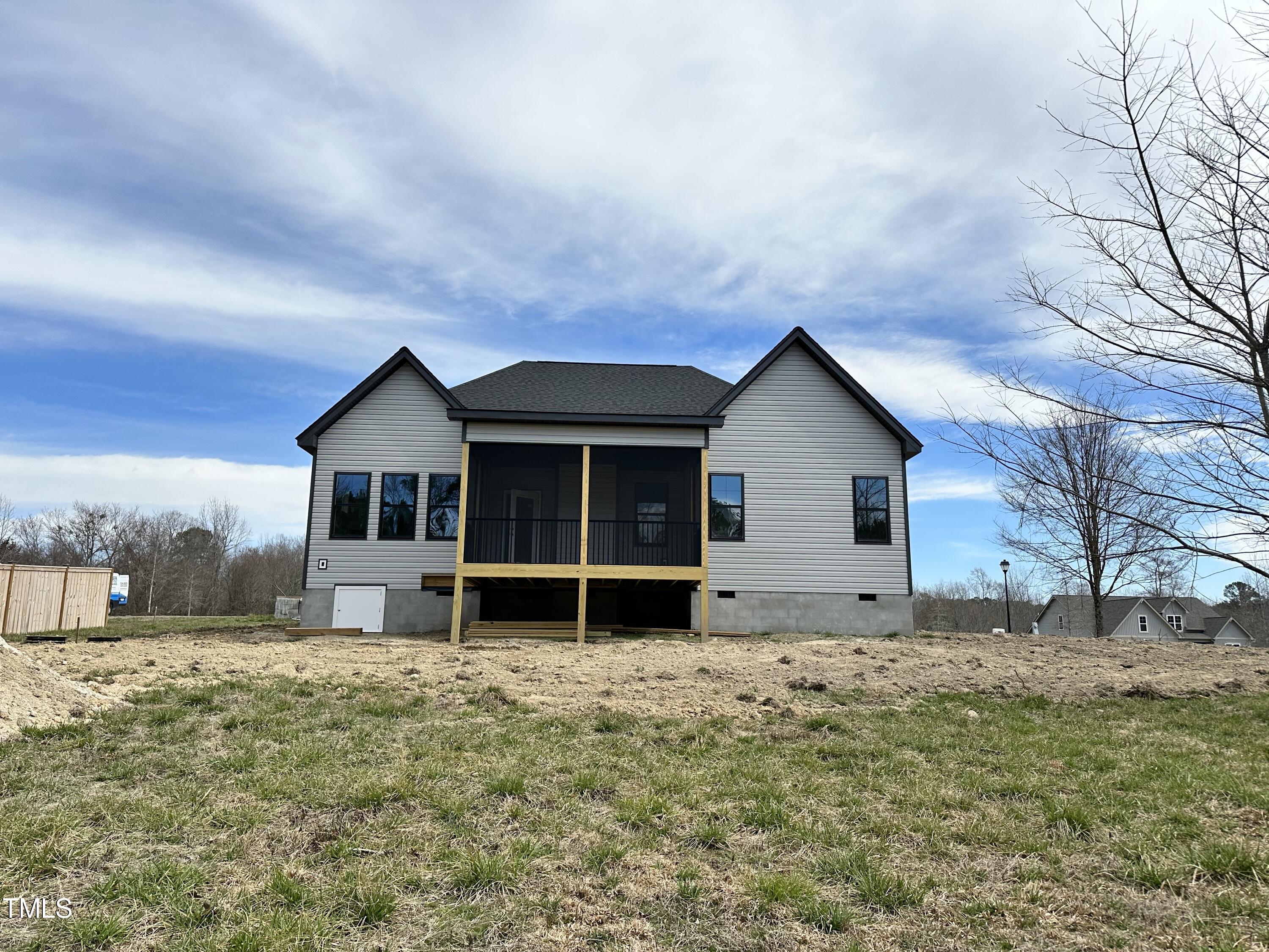 60 Pilot Ridge Road Zebulon, NC 27597 - Photo 3 of 7 a view of house with a yard