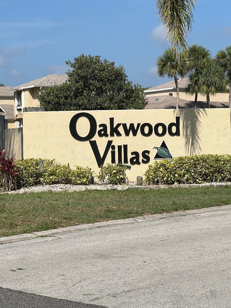 1461 Sheafe Avenue Northeast, Unit 106 Palm Bay, FL 32905 - Photo 3 of 13 a street sign that is sitting on the side of a road